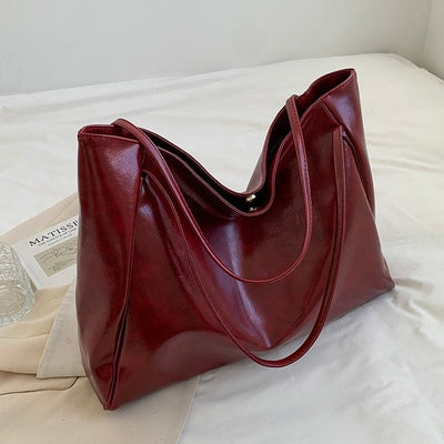 Aurora™ | Sac en Cuir Brillant