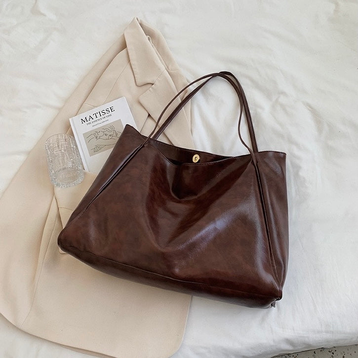 Aurora™ | Sac en Cuir Brillant
