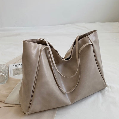 Aurora™ | Sac en Cuir Brillant